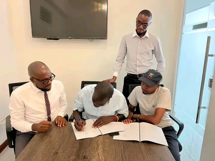 Signing a contract with Matatu Workers Union